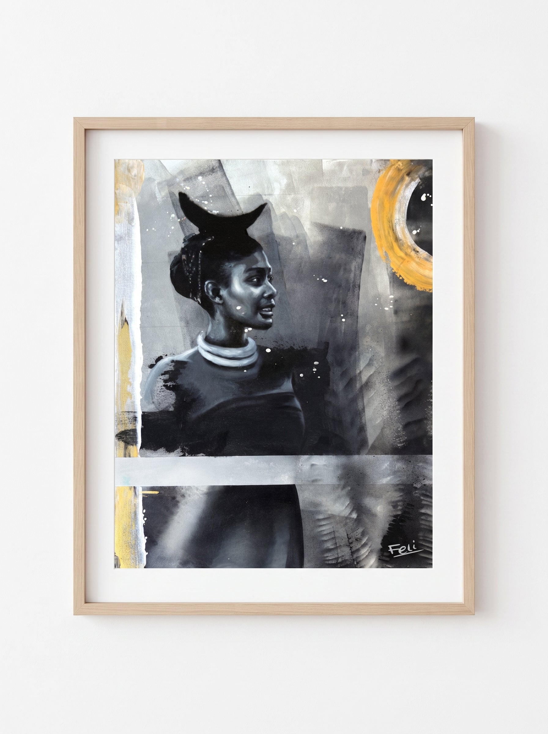 my footprints by feli the artist is A framed abstract art print featuring a stylized portrait of a black african indian woman in black and gray tones with a bold yellow circular element, displayed in a light wood frame against a white wall.
