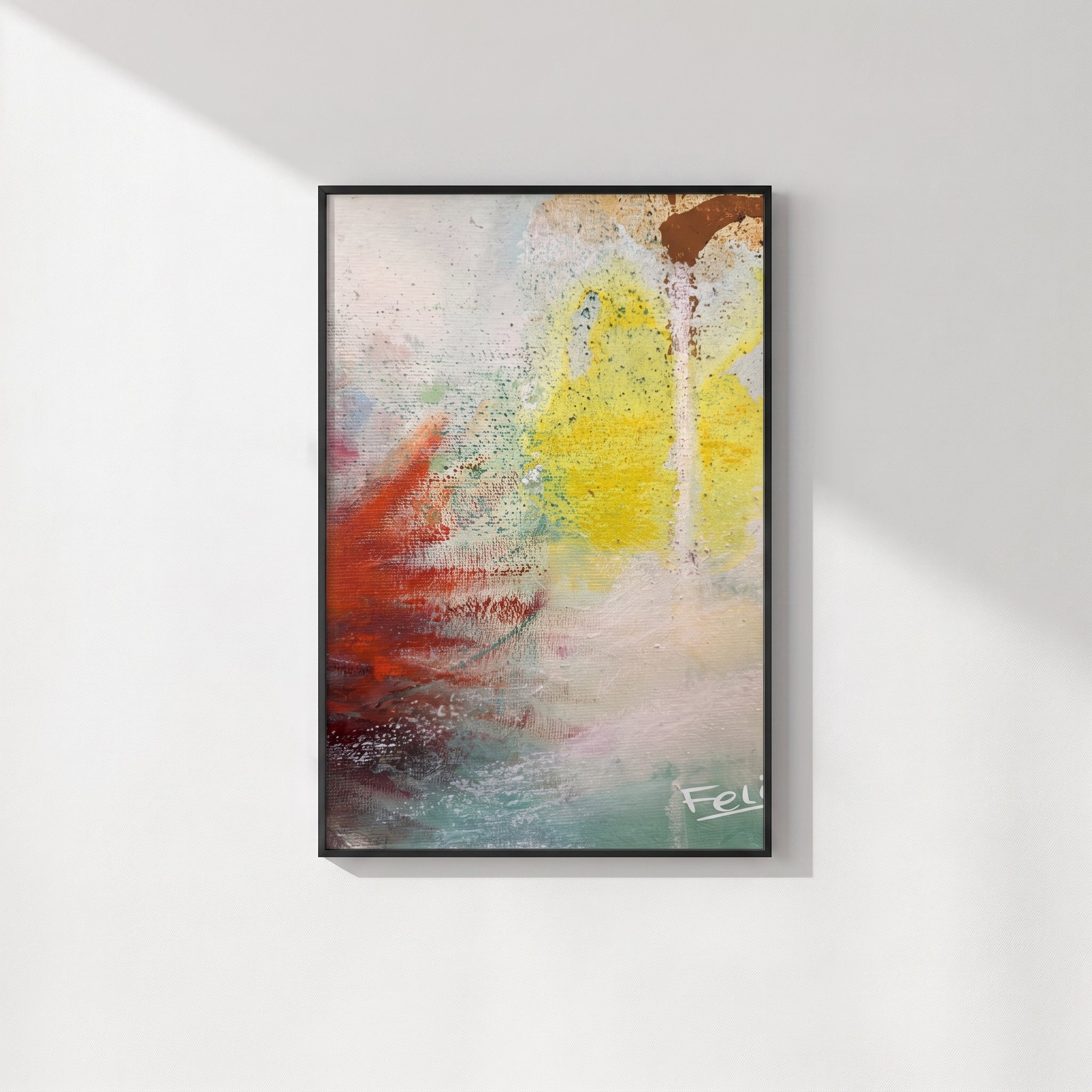A touch of the sky by Feli the Artist Abstract framed art print with expressive brushstrokes in yellow, red-orange, teal, white, and brown framed and hang on white wall