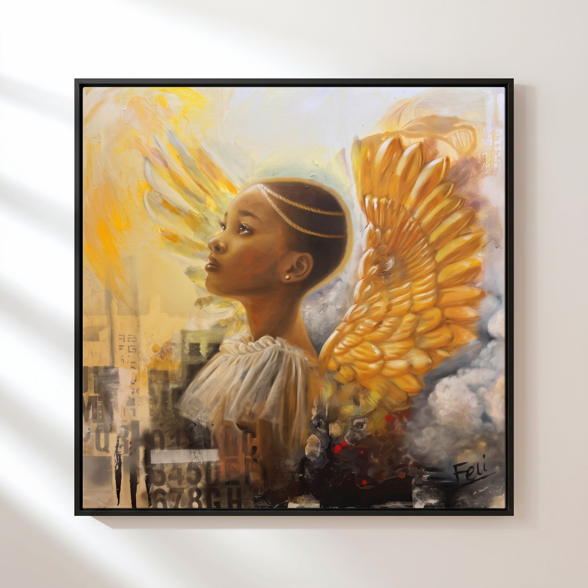 Rays of Hope by feli the artist A framed art print hang on a white wall of a young black african child with large golden angel wings, against a soft cream and gray background with collage-like city elements and smoke.

